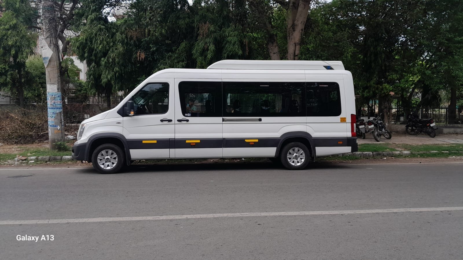 11 Seater Traveller by Prisha Tour Travels